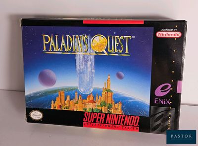 La boîte du jeu « Paladin's Quest » est posée sur une table.