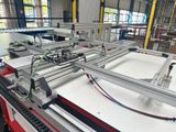 a machine that is working on a piece of metal