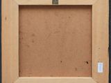 a close up of a picture of a picture frame on a wall