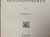 an old book with a black and white title on it