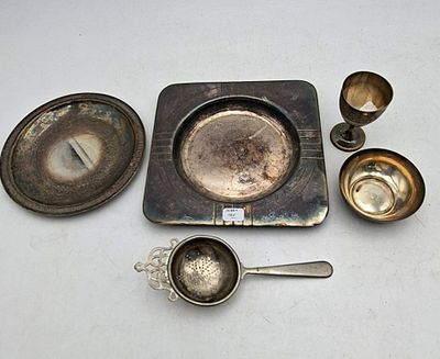 a lot of silver items that are on the table