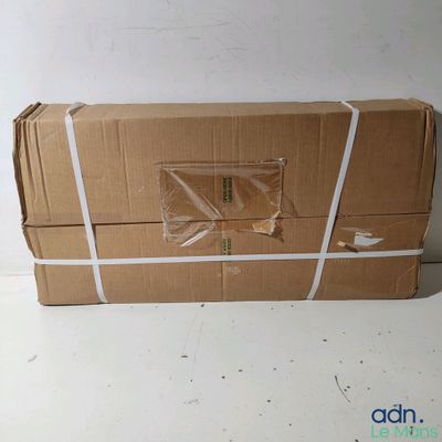 a cardboard box that has been wrapped in plastic