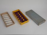 three boxes that are sitting on a table