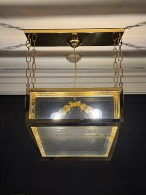 an image of a light hanging from a ceiling in a room