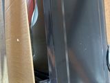 a box that has a microwave inside of it