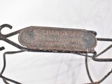 a metal object that has a sign on it