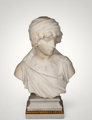 a white marble bust of a woman with a hat on her head