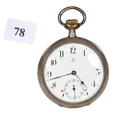 a silver pocket watch on a white background with a price tag