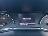 the dashboard of a car with a digital display on it