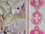 a close up of a wallpaper with a bird and flowers on it