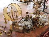 a table with a lot of antique items on it