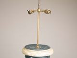a statue of a bird that is on top of a pedestal