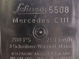 a plaque on the side of a building that says mercedes ' s c 11