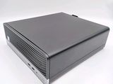 the computer is sitting on a white surface with a white background