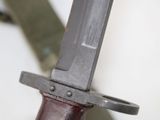 a close up of a knife that is on a table