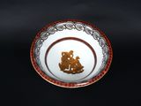 a plate with a picture of a man and a woman on it