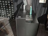 an image of a black cabinet in a room
