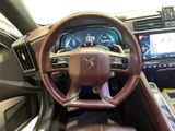 the interior of a car with a steering wheel and a dash board