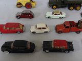 a lot of toy cars that are sitting on a table