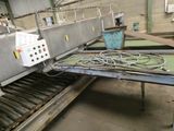 a conveyor belt in a factory with a lot of wires on it