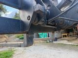 an image of a close up of a construction vehicle ' s front end