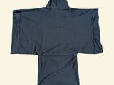 the back view of a blue kimono with a white background