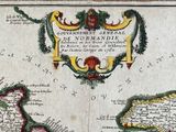 an old map of the island of guernsey with a coat of arms on it