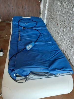 a mattress that has a blue cover on it