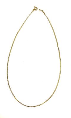a gold chain necklace on a white background