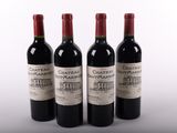 trois bouteilles de vin rouge posées côte à côte sur une table