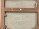 a picture of a painting on a easel with chalk written on it