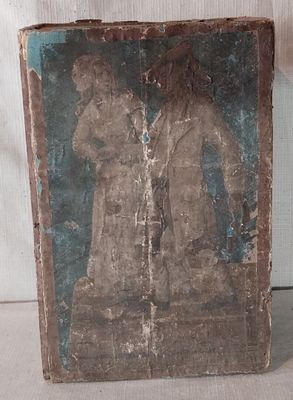 an old book with a painting of a man holding a dog