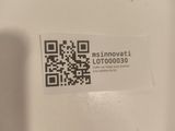 a qr code on the back of a toilet seat
