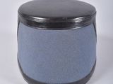 a black and blue container with a lid on a white surface