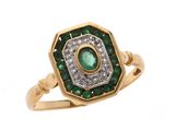 une bague ancienne sertie d'une émeraude et de diamants