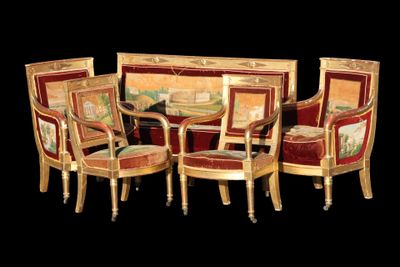 a group of chairs and a table in a room
