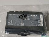 a close up of a battery in a plastic bag on a table