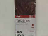 a close up of a package of brown plastic sheets on a white surface