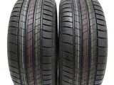 a pair of tires on a white background with the words vendu par lot de 2