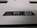 the back of a white box with a black and white label on it