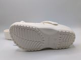 the sole of a pair of white shoes on a white surface