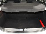 a trunk of a car with the back seats folded down