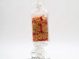 a bag of pasta sitting on top of a black stand