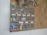 a wall with a bunch of tools hanging on it