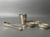 several silverware items including spoons, cups, and spoons