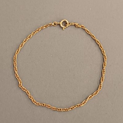 Bracelet souple (chaine de poignet) en or jaune 18K torsadé, - Photo 1