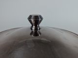 an image of a close up of a pan with a lid