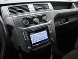 a dashboard of a car with a radio and a steering wheel