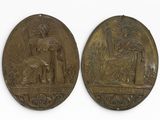 deux médaillons en bronze représentant une femme et un homme dans un jardin