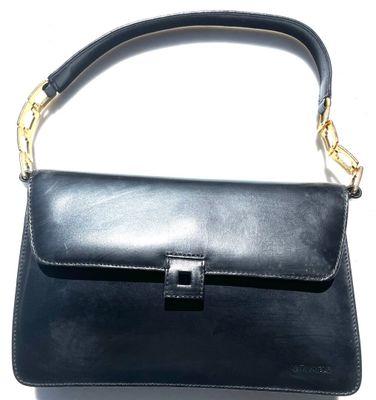 black leather handbag with gold hardware and chain strap